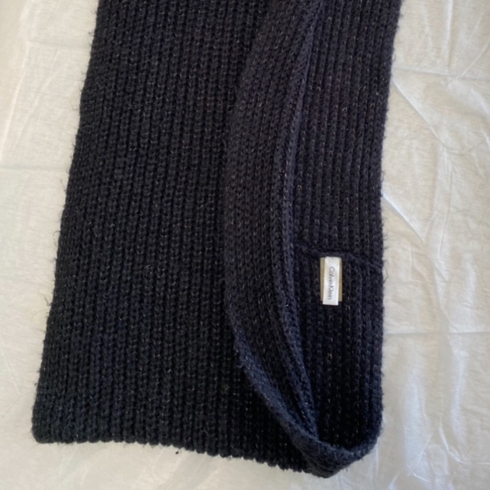Calvin Klein black knit wraparound scarf with gold shimmer accents. - Picture 2 of 2